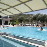 Lägenhetshotell Whispering Sands